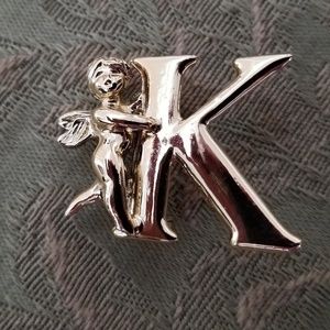 Gold Colored Pin w/"K"